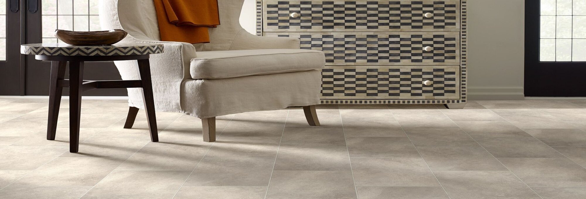 Armchair and table on tile - Diamond Floor Covering in Monroe